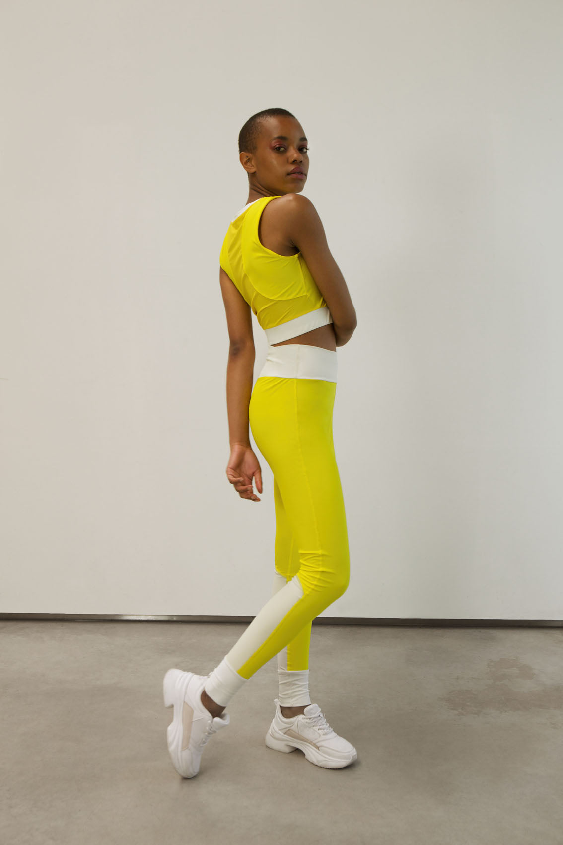 high-waist tights made from recovered sea fishing nets | energetic yellow - ivory