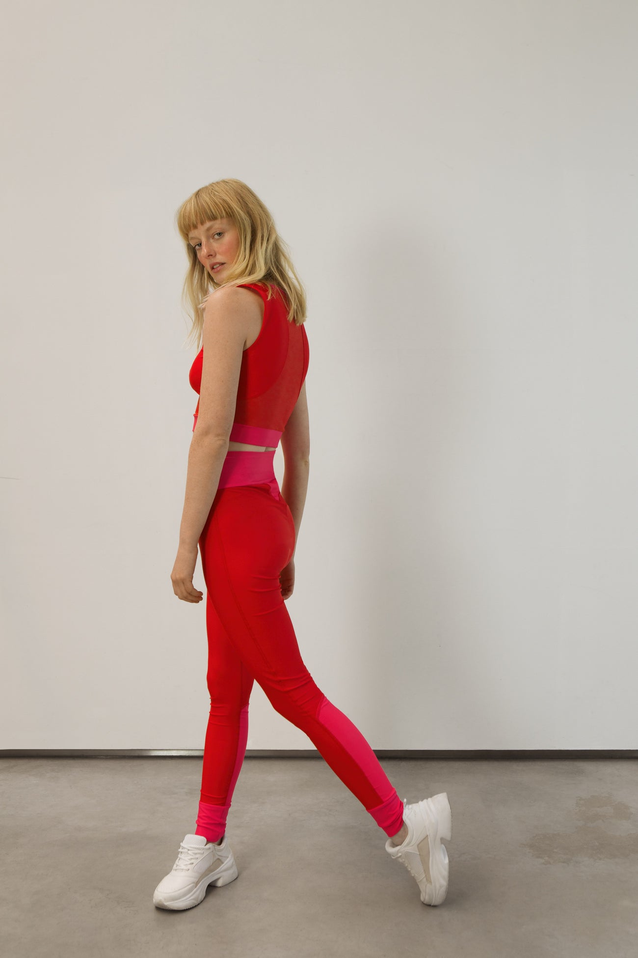 high-waist tights made from recovered sea fishing nets | adrenaline red-charged pink