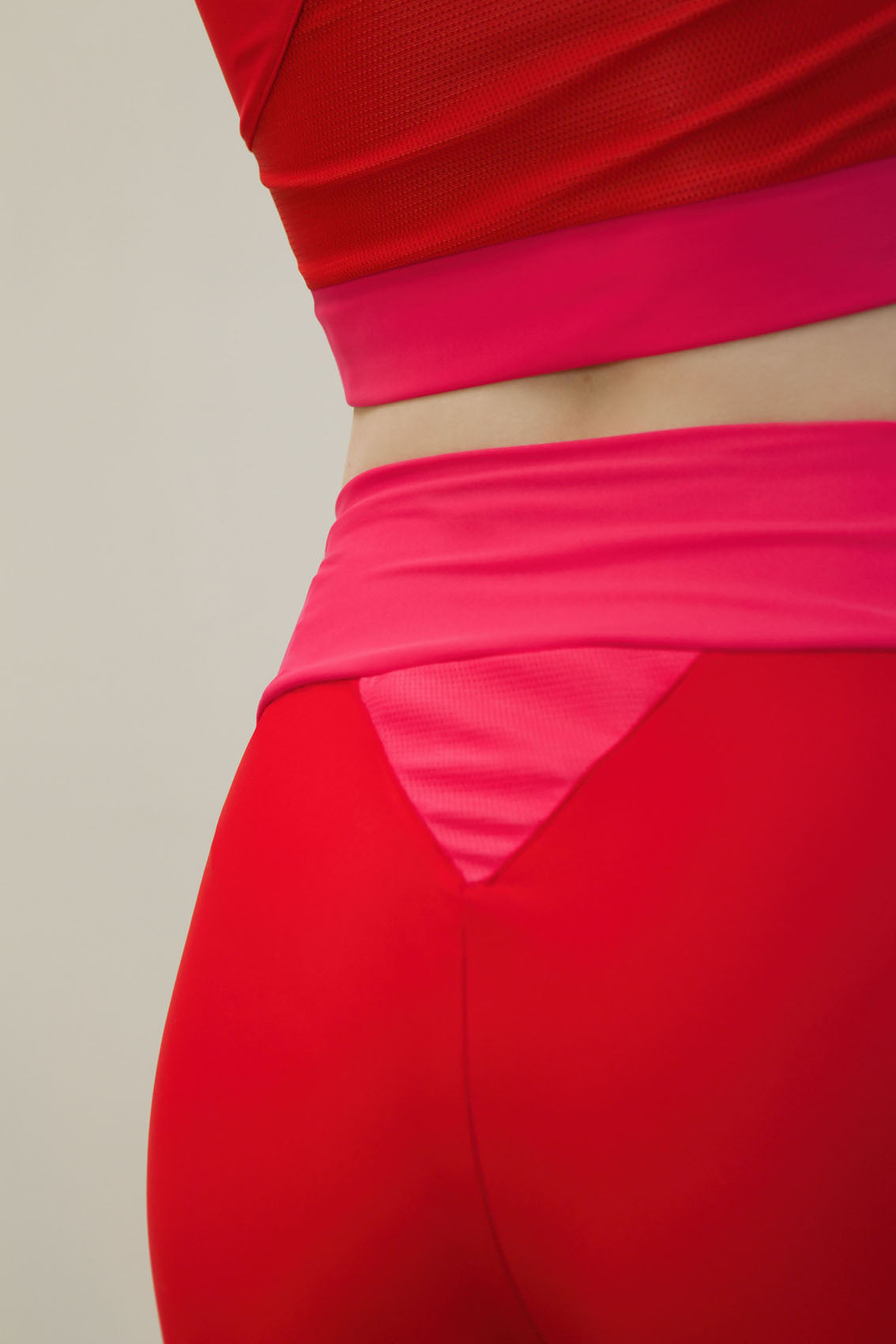 high-waist tights made from recovered sea fishing nets | adrenaline red-charged pink