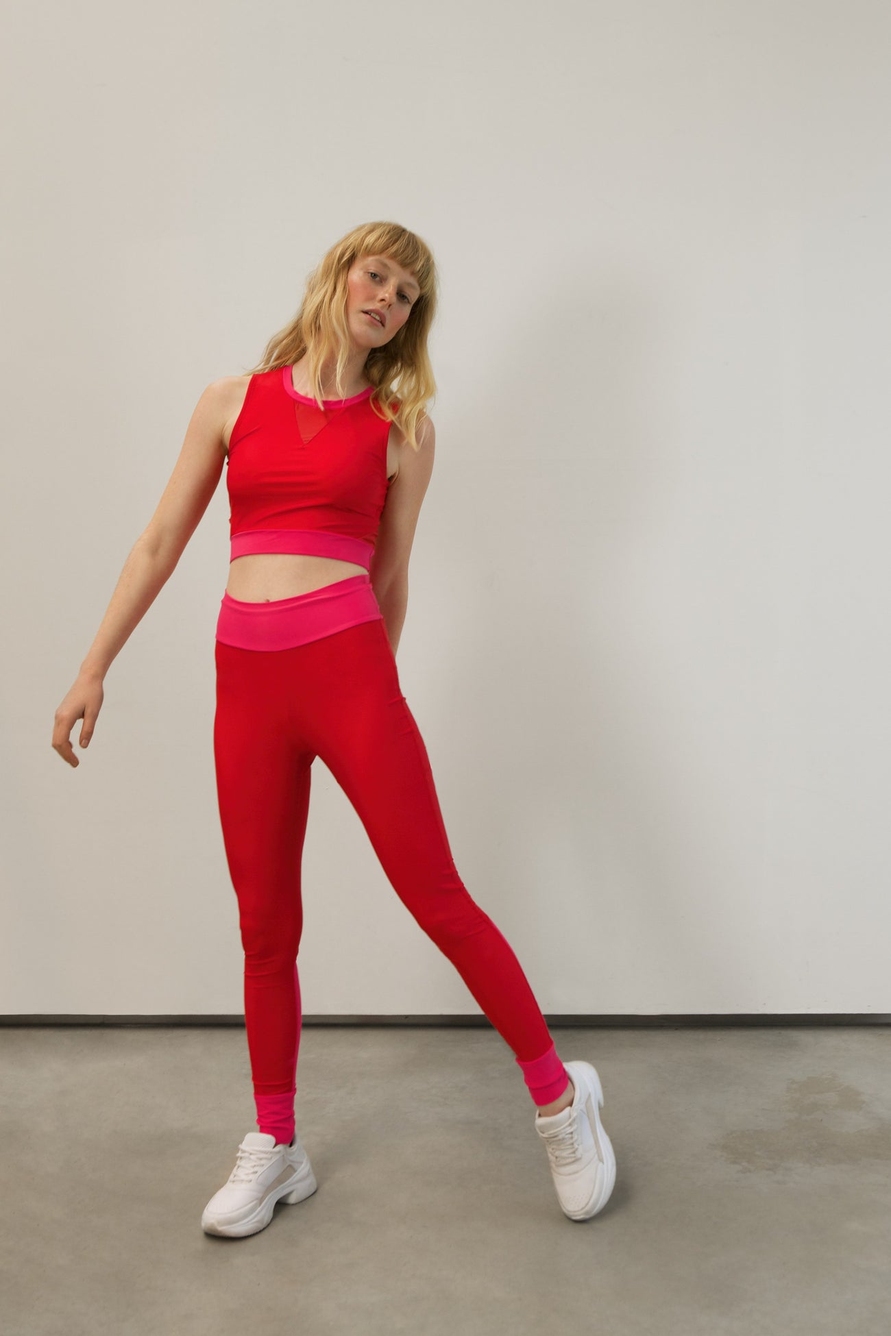 high-waist tights made from recovered sea fishing nets | adrenaline red-charged pink